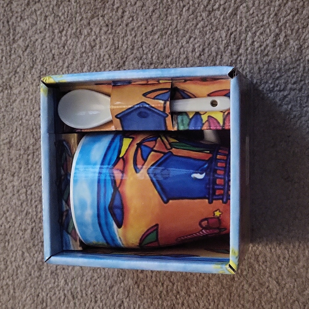 Brand new tea cup with spoon
